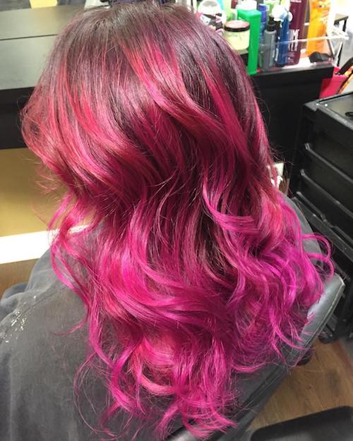 wavy hair with hot pink highlights